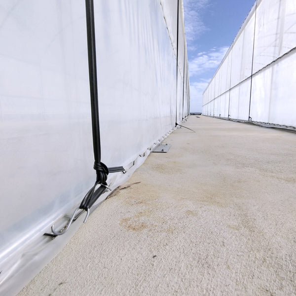 close up of greenhouse film tension rope